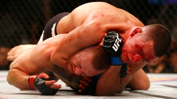 ufc-196-nate-diaz-beats-conor-mcgregor-miesha-tate-defeats-holly-holm.jpg